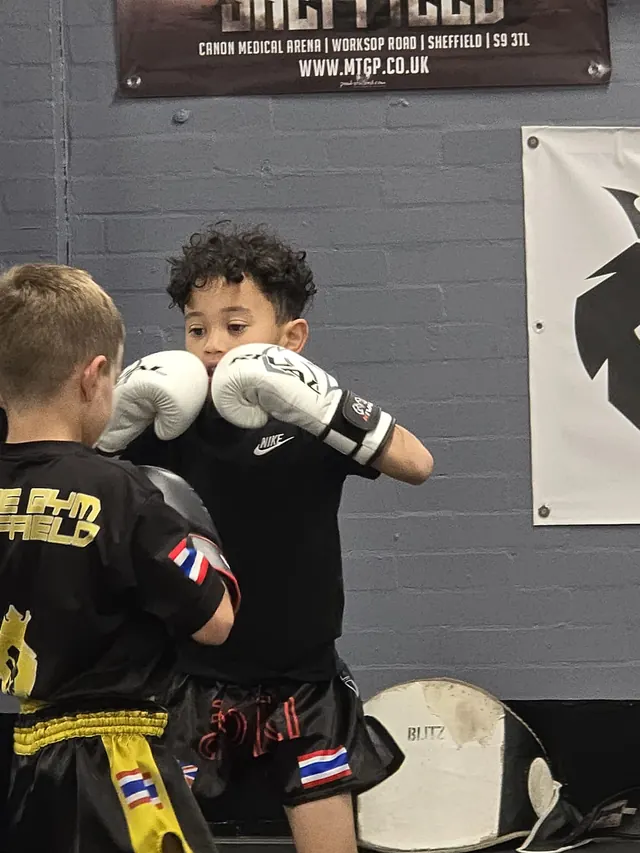 Two boys practising Muay Thai in a kids class at Pride Gym Sheffield